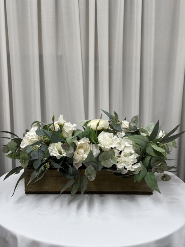 Silk Floral Table Runner on Wooden Box Photo