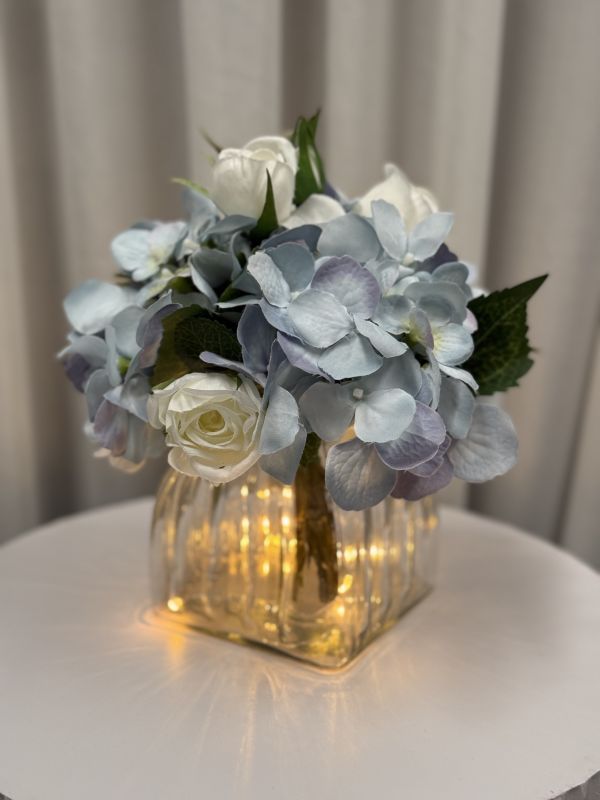 Small Light Blue Hydrangea & White Rose Arrangement Photo