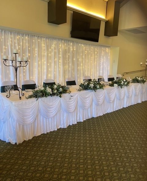 White Scallop Table Skirt Photo
